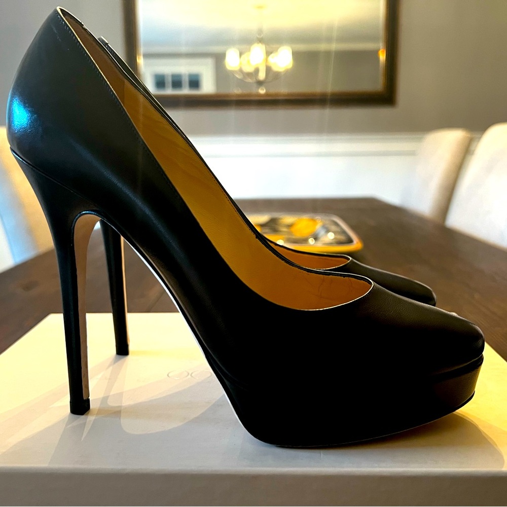 Jimmy Choo Cosmic Pumps in Black Leather. Worn once. Excellent used condition.